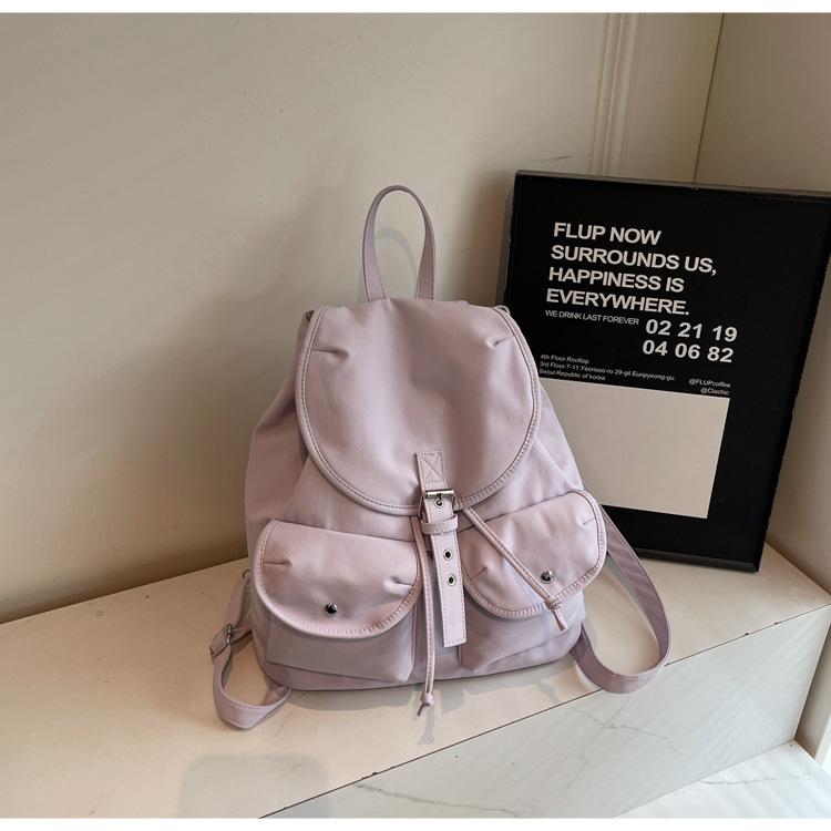 

2025 нишевый дизайн рюкзак женский большой вместимости для поездок на работу универсальный студенческий школьный рюкзак многокарманный простой рюкзак для поездок на работу фиолетовый