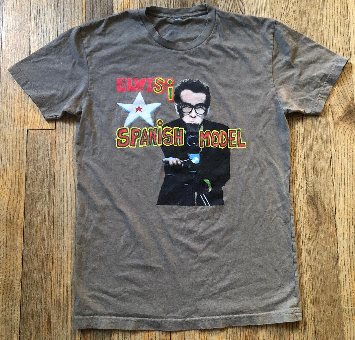 

Elvis Costello ‘Spanish Model’ Unisex Charcoal Cotton T-Shirt S To 5XL MC368 Unisex T-Shirt XXXXL