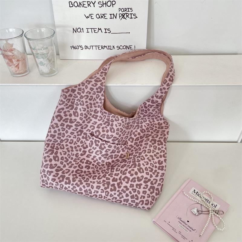 

Korean version of retro leopard print suede shoulder bag fashion high sense early autumn doublesided back tote bag women
