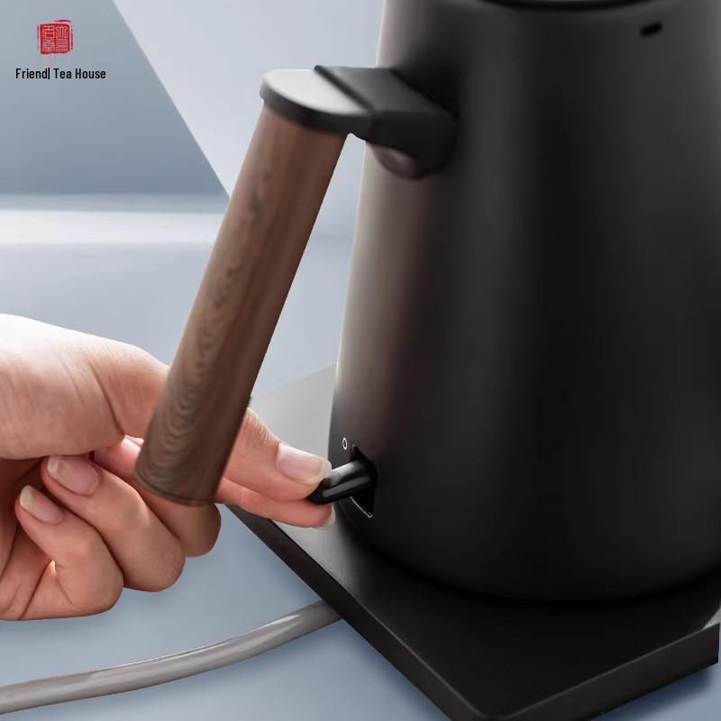 Youmingtang Black & White Electric Kettle: Fast Boiling for Home, Tea Brewing, Water Heating, and Hotel Use.