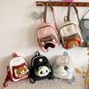 Cute Cartoon Trendy Backpack: Large Capacity, Lightweight, Versatile Travel/School Bag with Earphone and Doll Holder.