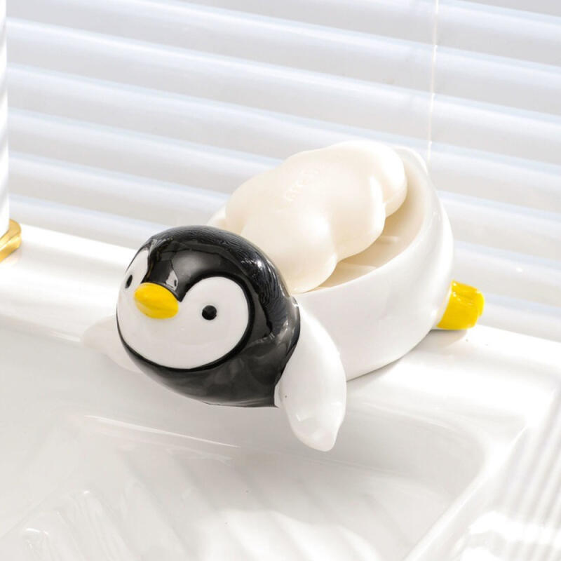 Draining Prone Penguin Soap Dish