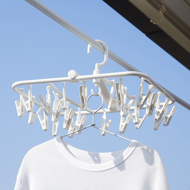 Portable White Plastic Clothes Hanger With 24 Clips For Efficient Drying