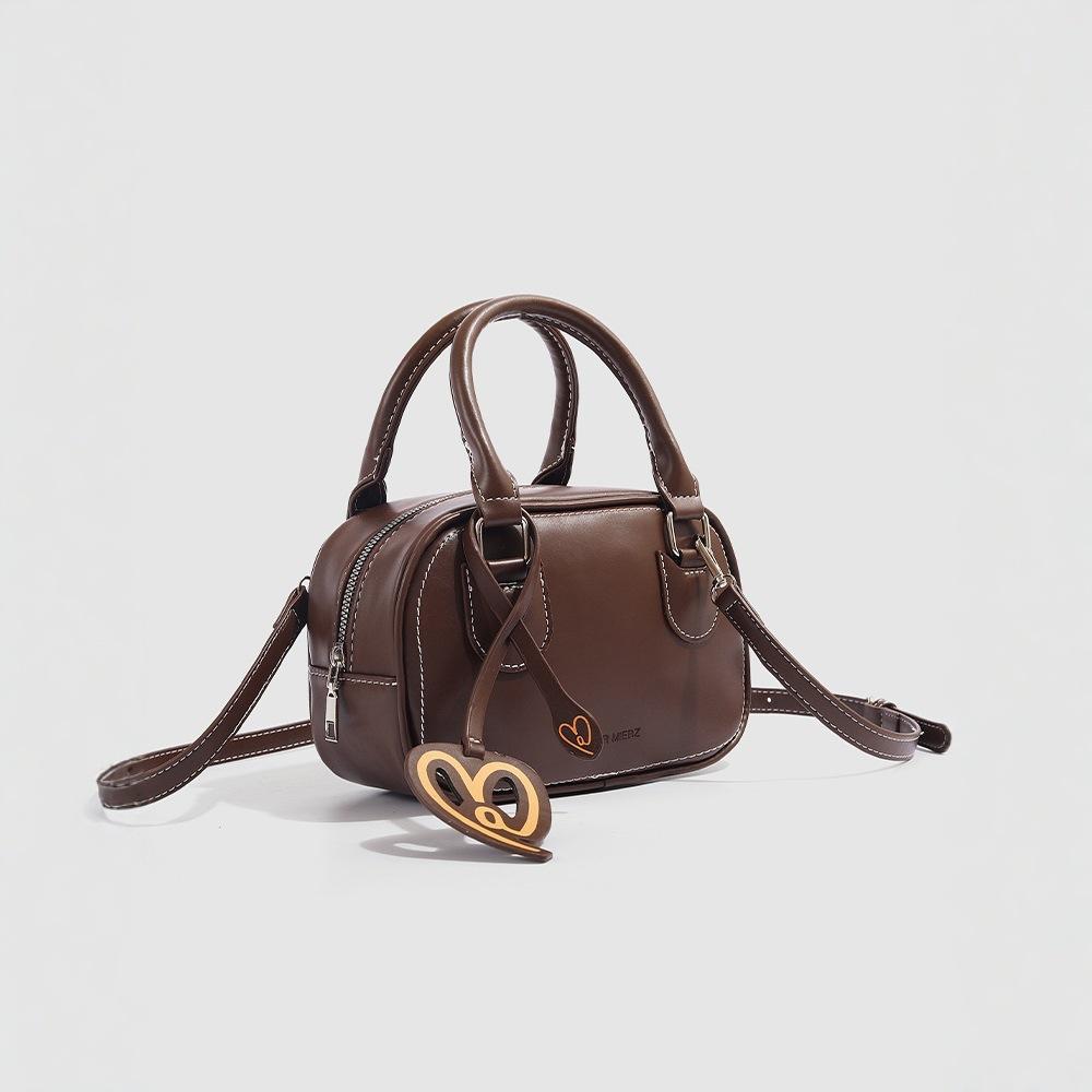 Women's bag 2025 new model, niche design, casual shoulder and crossbody bag, fashionable everyday versatile handbag, bowling bag