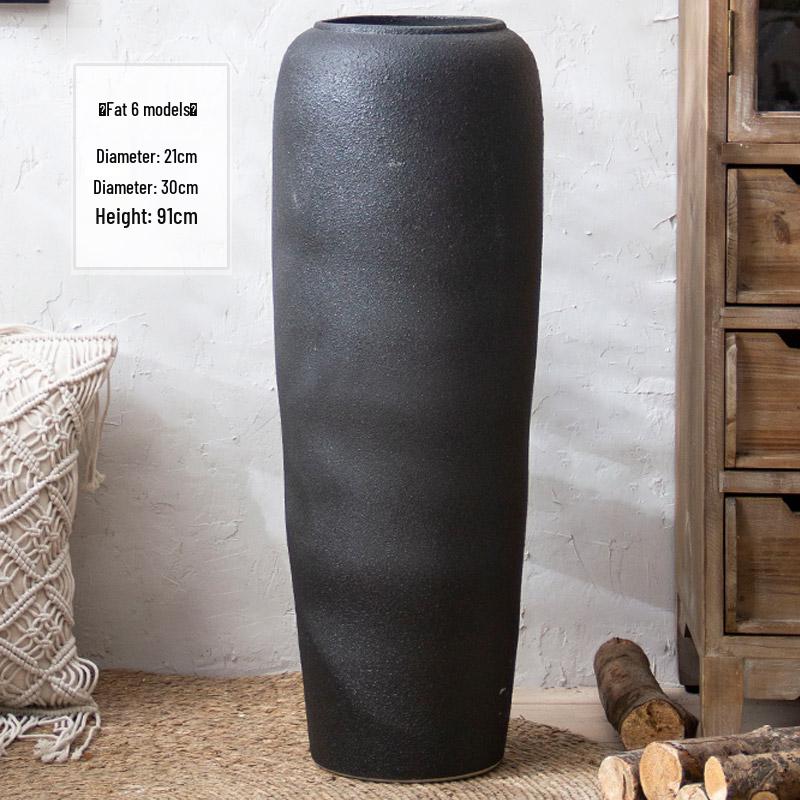 Jingdezhen Black Coarse Pottery Floor Vase: Modern Minimalist Japanese Decor for Hotel, Homestay, or Living Room.