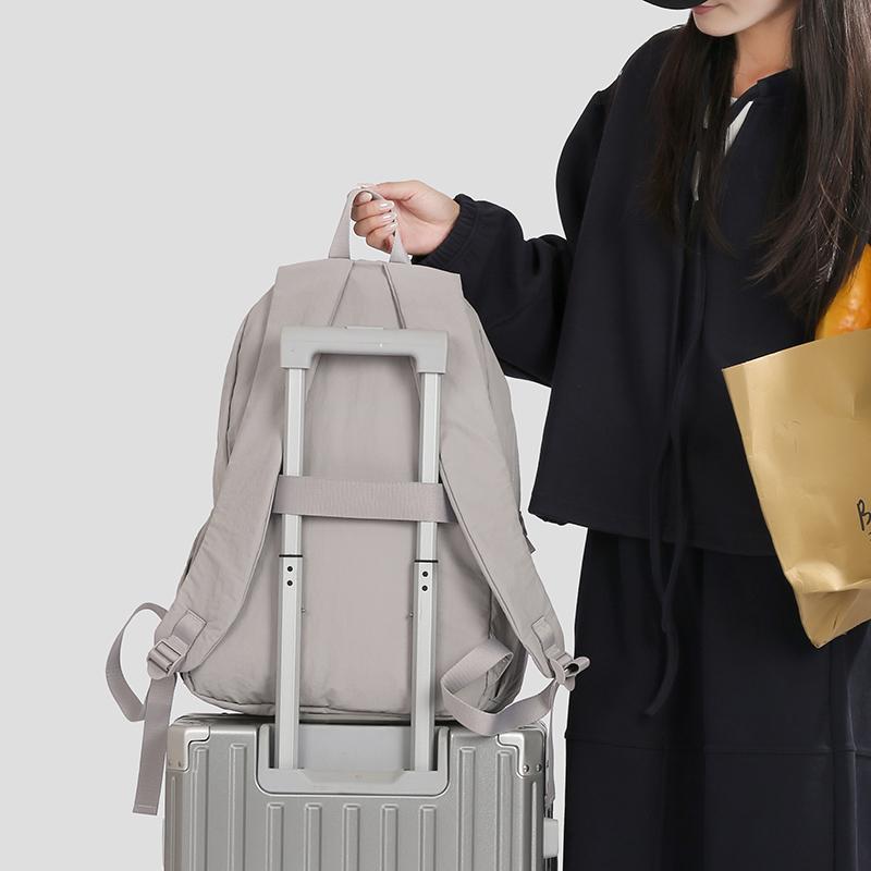 Ryggsäck i enfärgat dam lätt utomhusryggsäck stor kapacitet student skolväska