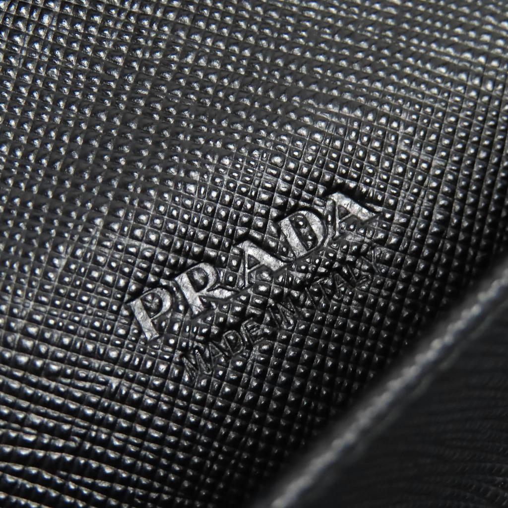 Great PRADA Triangle Logo Round Zip Long Wallet Black Safiano Leather 2ML188 Used