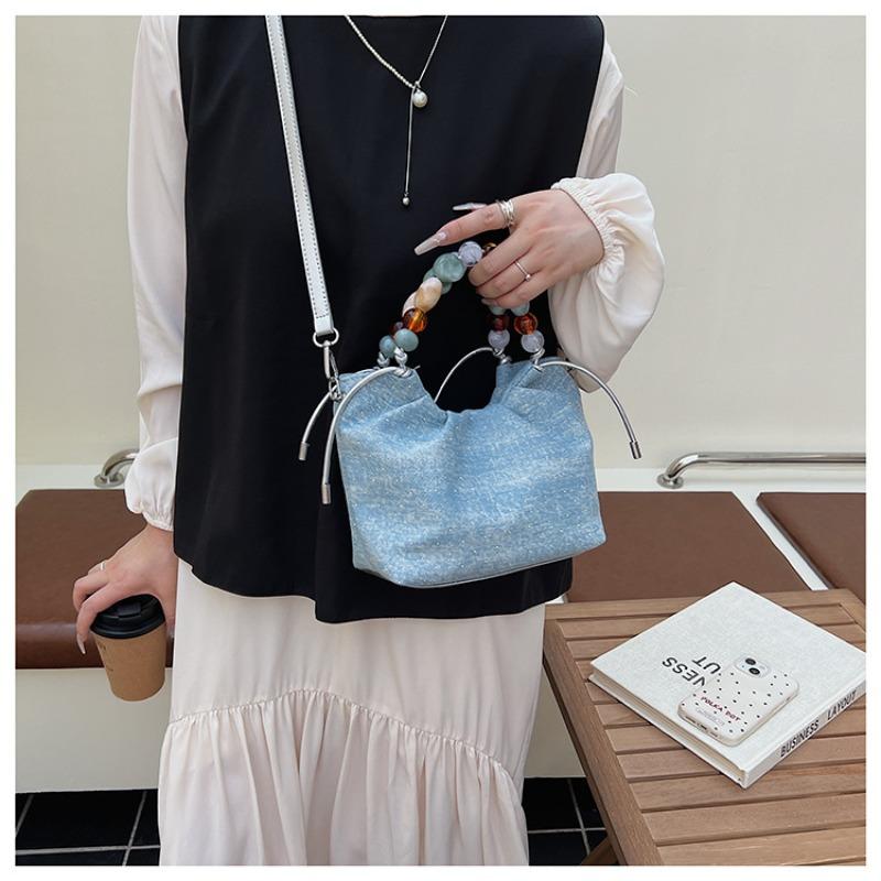 Pleated high-end fashion versatile new bucket bag women's solid color cute niche design messenger bag
