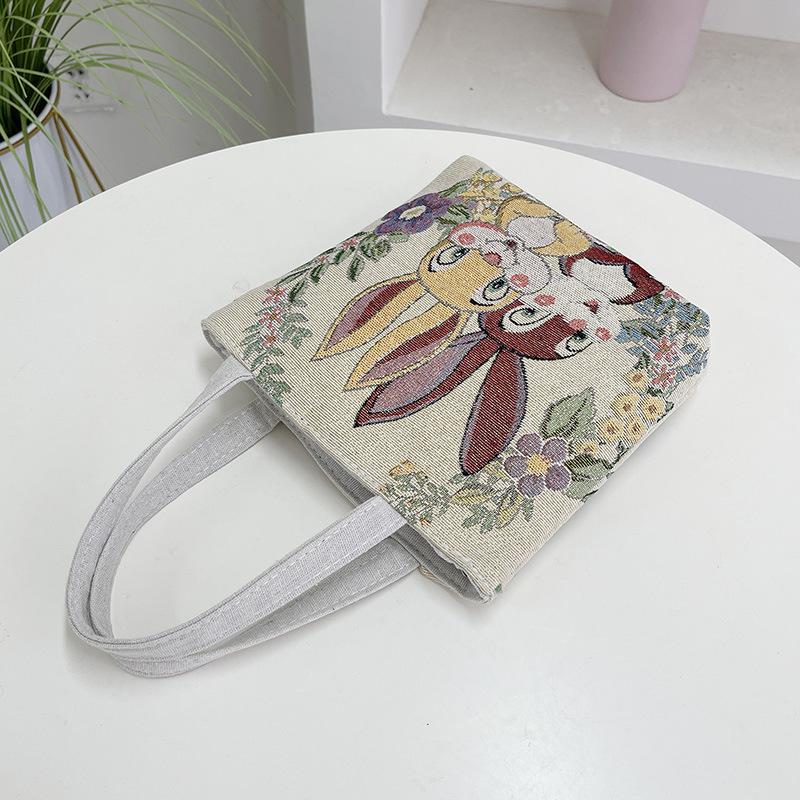 Golden silk bunny double-sided embroidered portable small bag women's new bag carry-on handbag change mobile phone bag