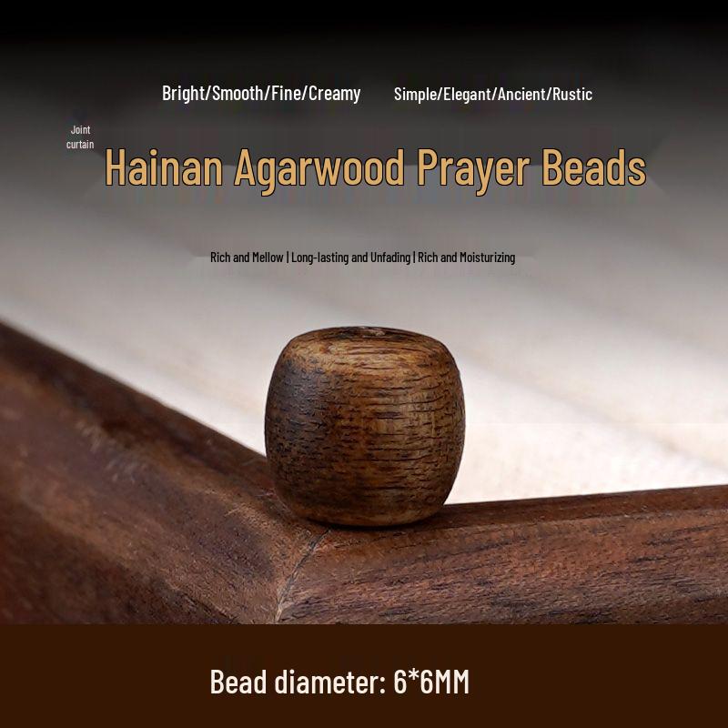 Hainan Qinan Agarwood Bracelet: Handmade Cultural Beads for Play and Prayer, Wooden Drum Beads, Buddhist DIY Accessory.