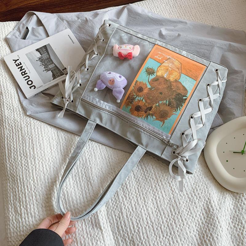 

Pain bag large capacity tote bag women s Japanese ribbon pain jk sweet girl two-dimensional soft leather transparent shoulder bag серый