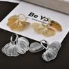 Light luxury super fairy hollow metal petal fringed ear buckle fashionable design high-end temperament elegant earrings