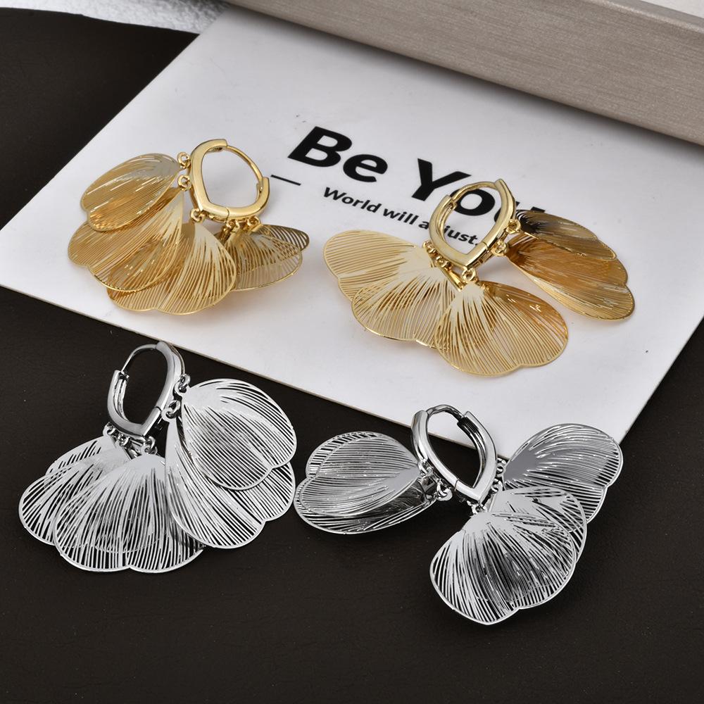 Light luxury super fairy hollow metal petal fringed ear buckle fashionable design high-end temperament elegant earrings