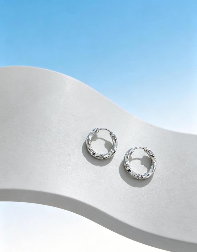 Elegant 316 Stainless Steel Twisted Hoop Earrings for Women - European & American Style, High-End Versatile Fashion Jewelry.