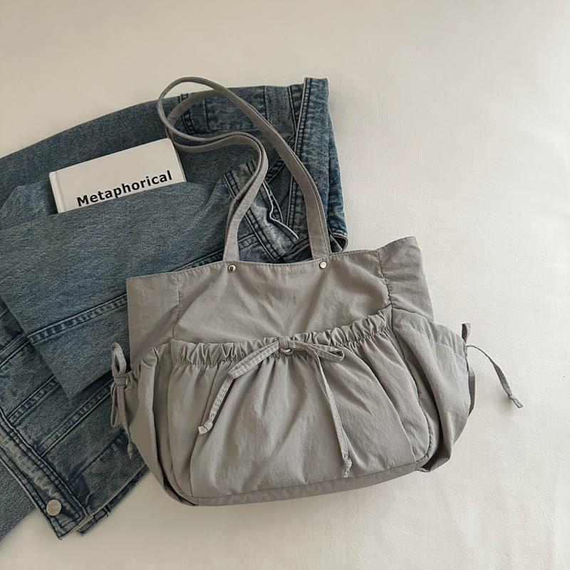 

Sweet pleated niche design bag 2024 autumn new lightweight fashion bow Korean version shoulder tote bag сірий колір
