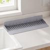 Scissor-Adjustable Sink Water Barrier for Single or Double Bowls with Ribbed Panel, Flexible Form and Return Flows Slope