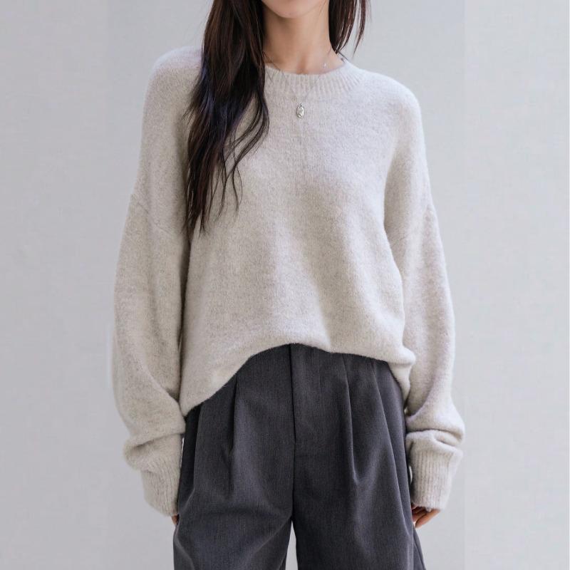 Autumn and winter new simple pullover knitted sweater crew neck sweater women's loose versatile lazy style solid color top tide