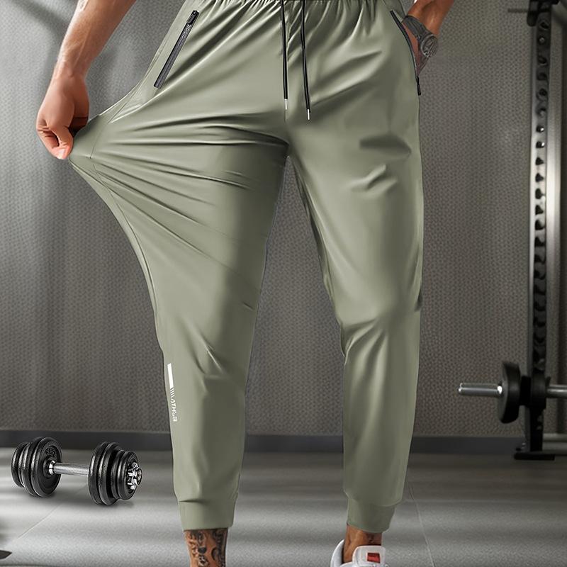 Oddychające Spodnie Dresowe Męskie Plus Size Casualowe dla Mężczyzn Spodnie do Treningu Szybkoschnące Proste Elastyczny Pas Koreański Klasyczny Sportowe