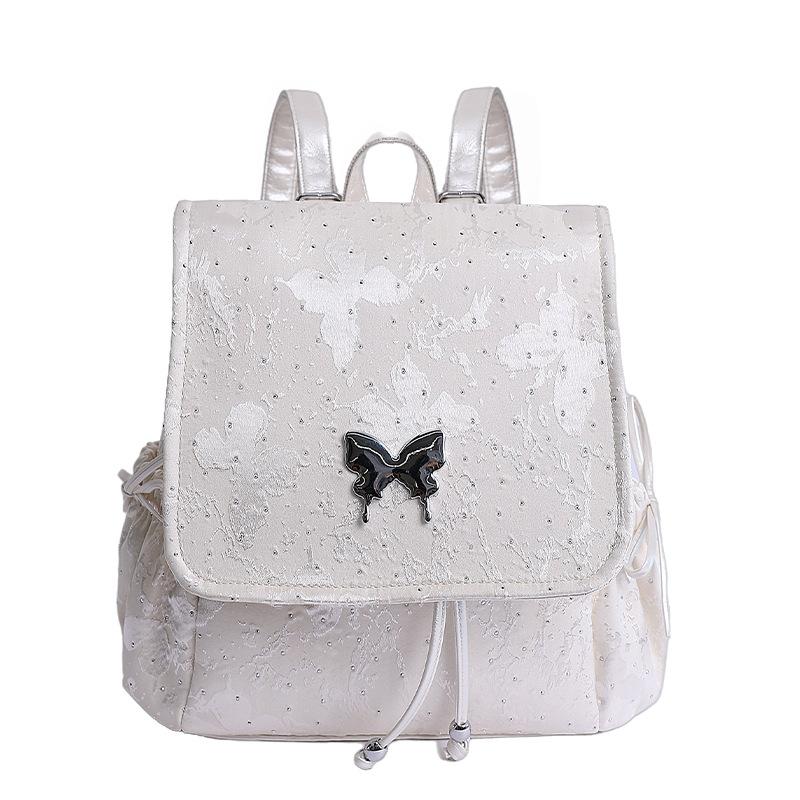 

2025 new trendy silver butterfly backpack bag, student class backpack, hand-held travel bag, high-value bag.