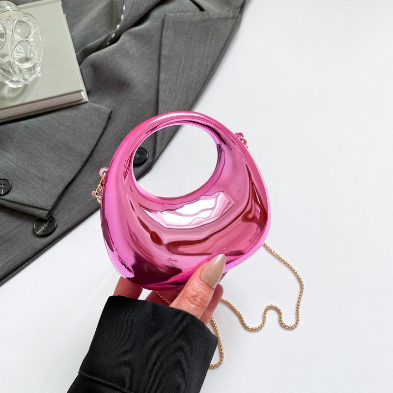 

European and American fashion women s bags 2025 new personalized glossy fashionable shoulder messenger bags, high-end dumpling bags рожевий