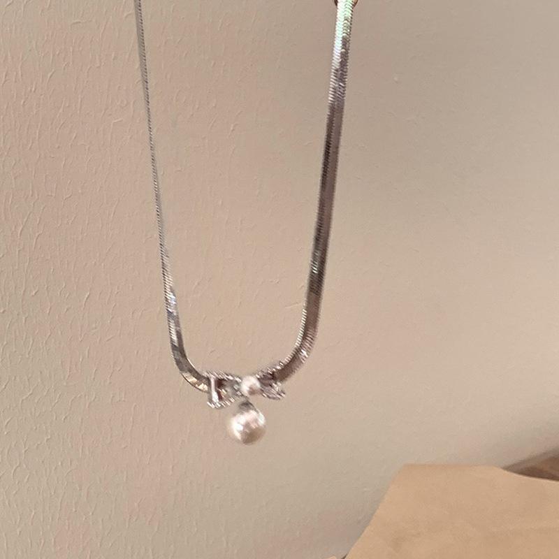 

Элегантное жемчужное колье-чокер «Змеиная кость» - Уникальный женский дизайн высокого класса