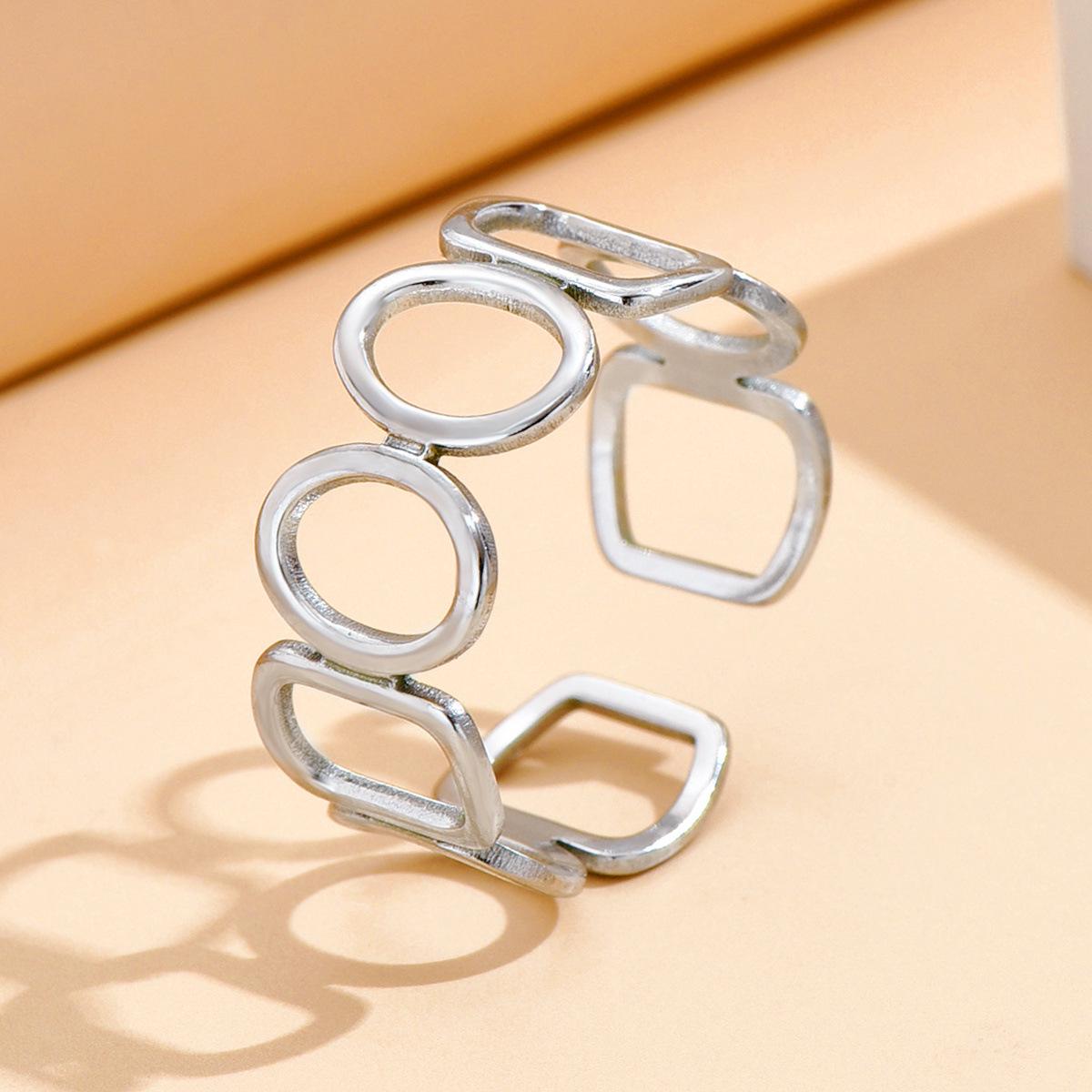 Unisex High-End Geometric Hollow Gold Titanium Steel Ring