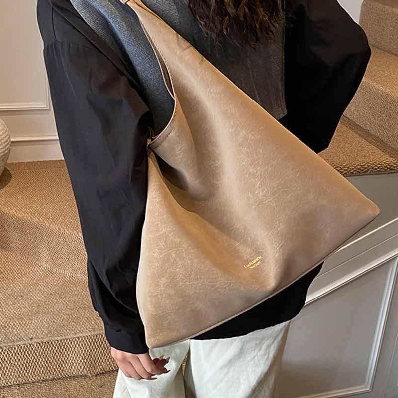 2025 Neue personalisierte Mode Lässige Schulter-Tragetasche Retro Große Kapazität Mode Pendler Schulterbrötchen Schwiegermuttertasche