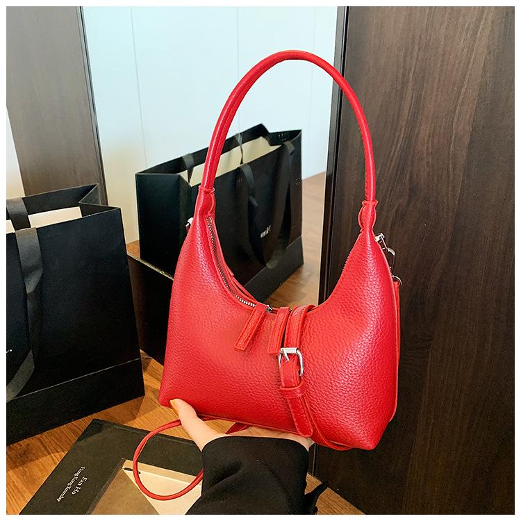 High-end niche bag women's new fashion simple messenger bag versatile shoulder armpit bag