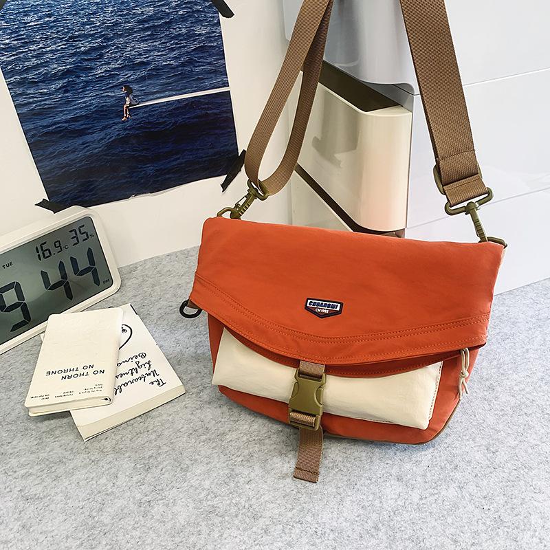 

Nylon cloth bag women s large-capacity new summer versatile outdoor sports wind messenger bag casual commuter bag