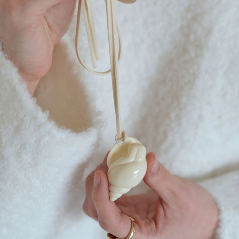 

YUNICITE CONCH FORMICA N CLEAR BLACK