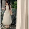 Design sense French niche hollow sleeveless neck sling dress backless strap gentle wind temperament long skirt