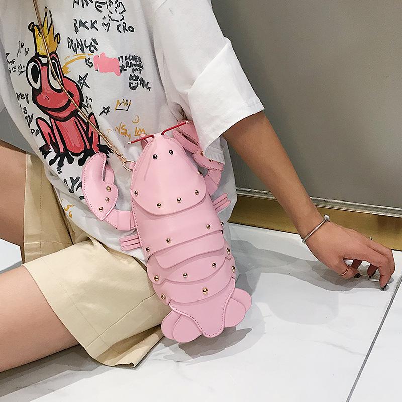 Cute Small Bag Women's 2025 New Messenger Creative Rivets Korean Version Fashion Versatile Funny Personalized Women's Bag