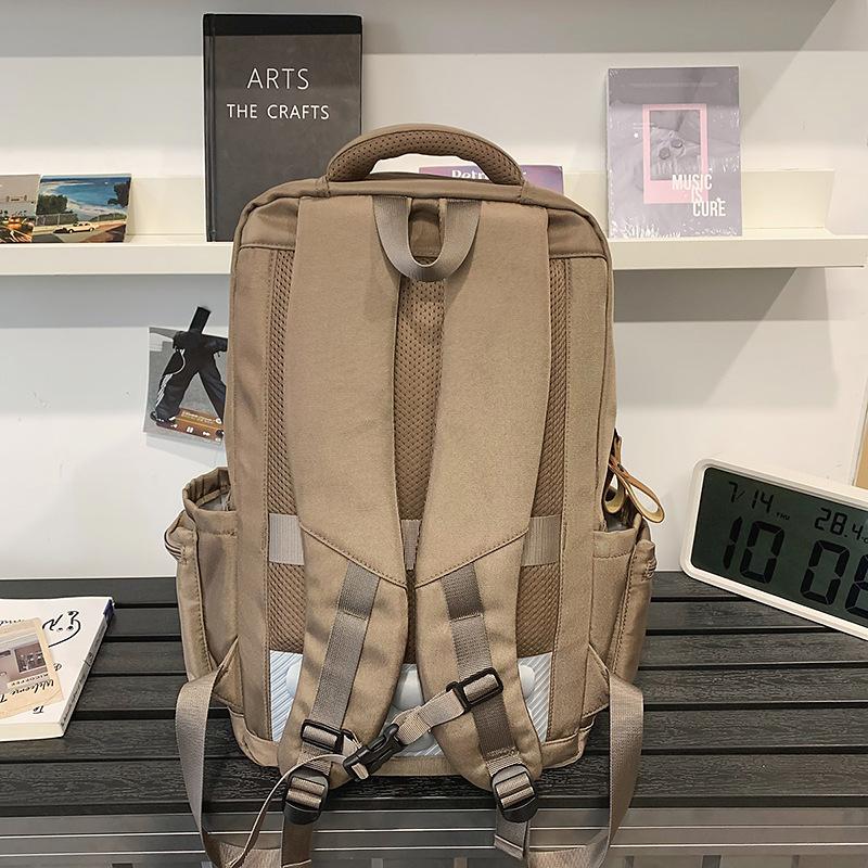 School Bag High-quality Couple Casual Backpack Large Capacity Multi-compartment Middle and High School Students Air Cushion Spine Backpack