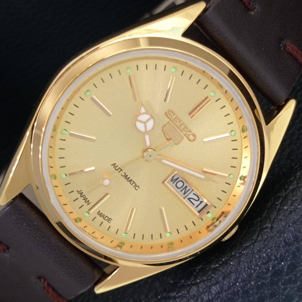 

ЯПОНСКИЕ ВИНТАЖНЫЕ ОТРЕМОНТИРОВАННЫЕ МУЖСКИЕ АВТОМАТИЧЕСКИЕ ЧАСЫ SEIKO 5 С ЗОЛОТИСТЫМ ЦИФЕРБЛАТОМ a442376-1