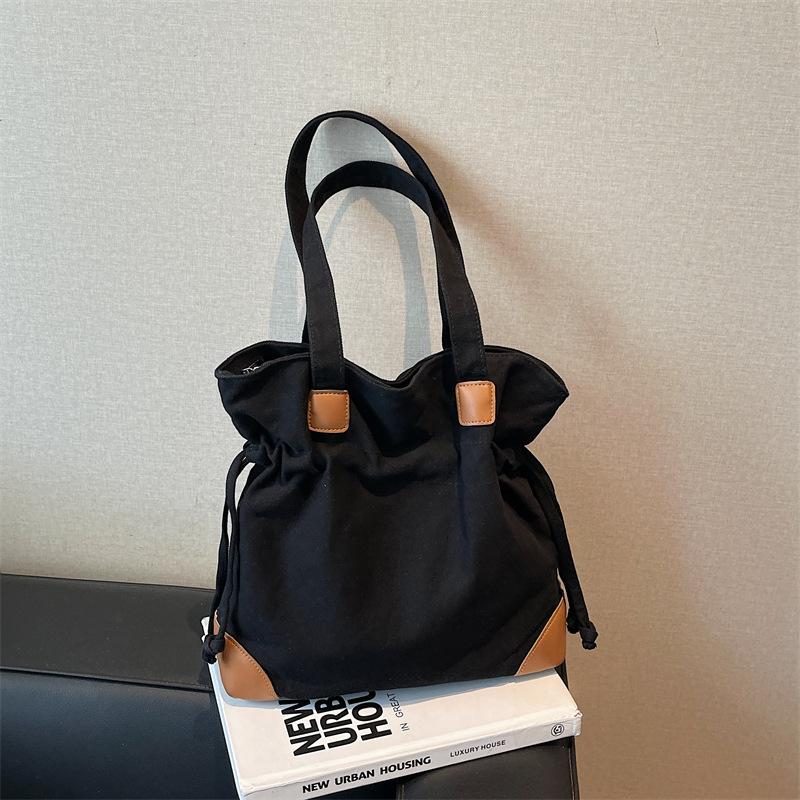 Casual Lazy Wind Simple Capacity Canvas Bag Women 2025 New Simple Korean Version Versatile Shoulder Bucket Bag