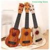 26/35cm Gitarre Schreibtisch Dekoration 4 Saiten Musikinstrument Mit Paddeln Simulierend Yukrili