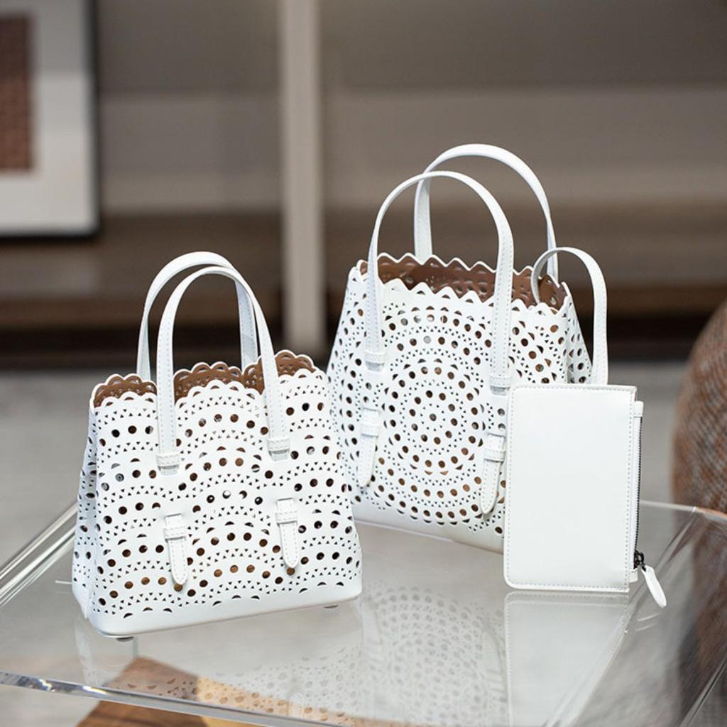 Velkoobchodní továrna prémiová niche vyřezávaná dutá taška na zeleninu Mina kožená dámská taška přes rameno crossbody tote taška