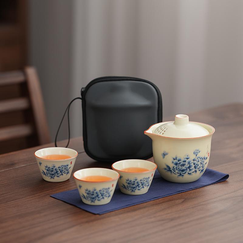 Premium retro Ru kiln, one pot, three cups of Qingyun peony hand-held pot, anti-scalding tea maker, camping gift travel tea set