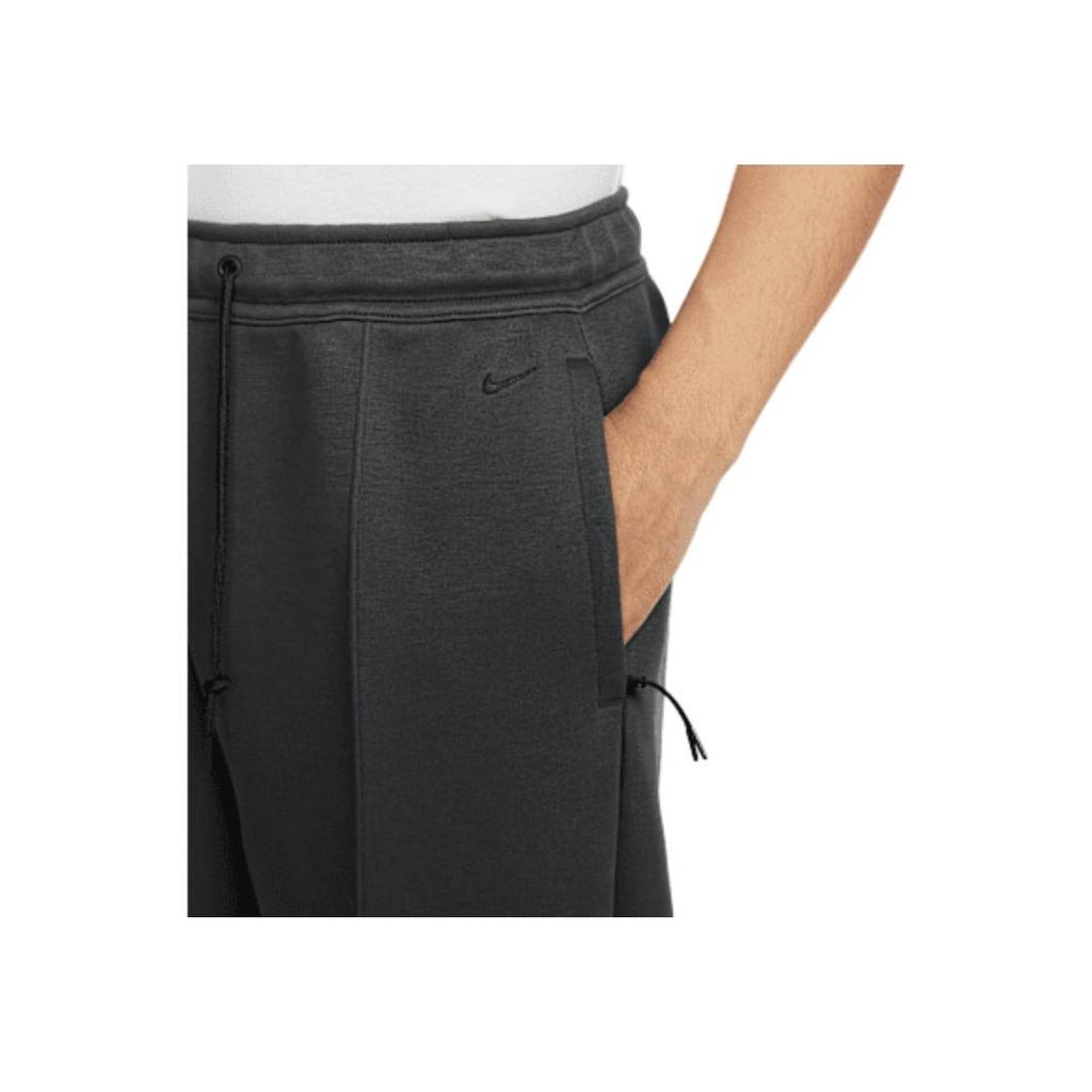Nike Moda Tecnologica Comodi Versatili Pantaloni Sportivi Lavorati a Maglia a Gamba Larga Uomo pantaloni Nero Carbone HJ0696-060