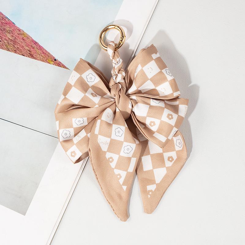 Luxury Bow Chain Bag Charm: Trendy Crossbody Strap and Elegant Pendant Accessory for Influencers