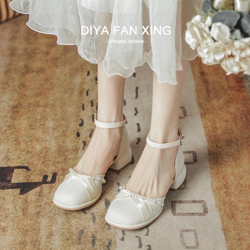 Baotou sandals women's summer new thick heel medium heel women's shoes one-word buckle sandals