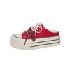 Thick-soled bag head with one foot on little white shoes 2025 new small muffin board shoes canvas half slippers women's summer outer wear