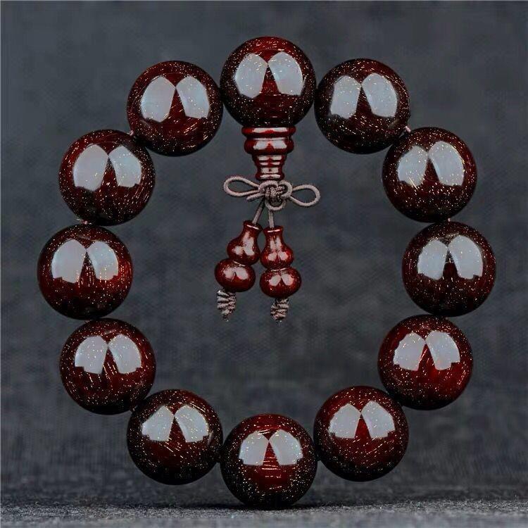 Herren Armband aus rotem Sandelholz mit goldenem Stern Agarholz Buddhistische Gebetsperlen