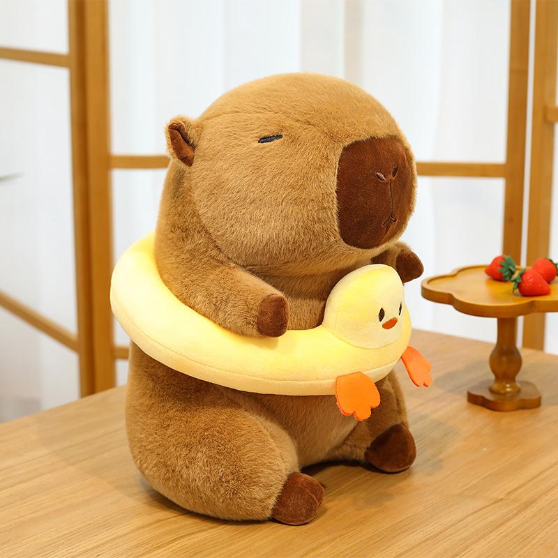 

New swimming ring capybara Kapibara plush toy cute girl children s toy doll doll 23cm (200g) Rabbit Hair