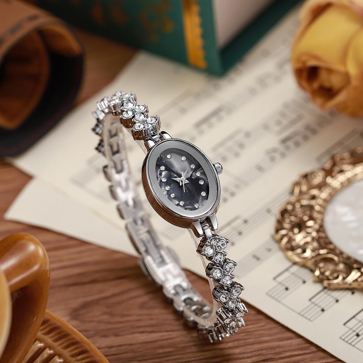 

Ladies exquisite and fashionable diamond dot scale oval dial full diamond steel strip quartz watch, suitable for daily wear, bi серебряный