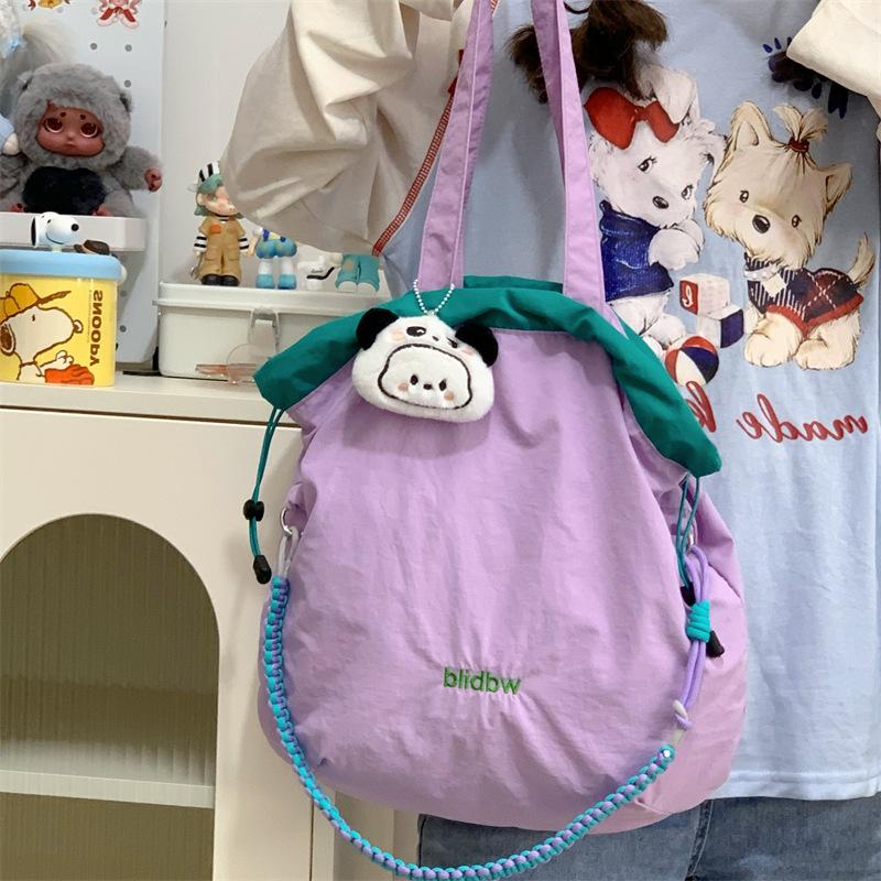 Niche Canvas Bag Color Matching Drawstring Adjustable Shoulder Strap Multi-function Hand Carry Contrasting Color Light Crossbody Shoulder Bag