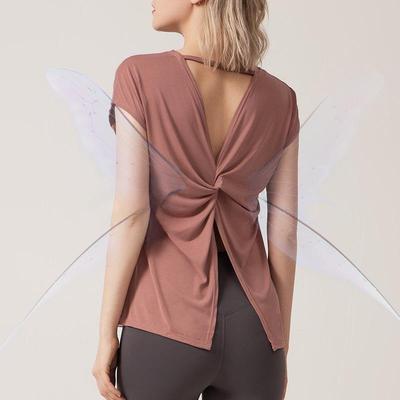 Nieuwe dames fitnesstops met korte mouwen, losvallend model, geschikt voor yoga en hardlopen, met split aan de achterkant.