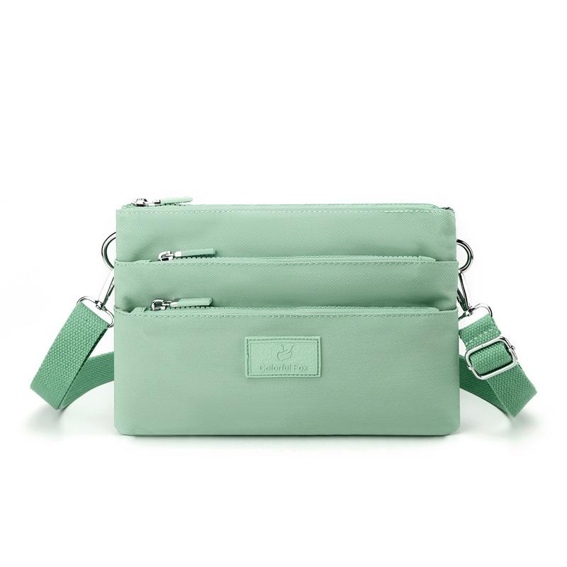 Crossbody bag women's large-capacity multi-layer shoulder bag simple versatile anti-splashing bag