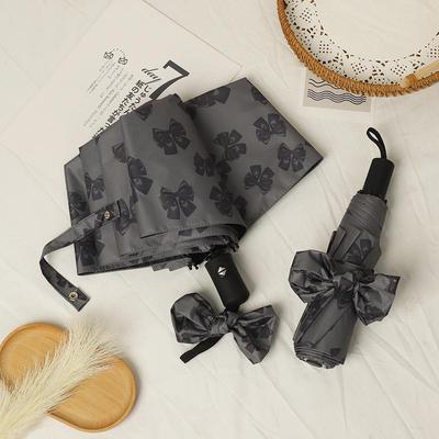 Women's Bow Sun & Rain Dual-Use Automatic Folding Umbrella - Compact, Fresh Sunshade with Black Glue for Sunscreen Protection.