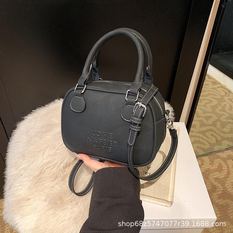 Niche Retro Bowling Bag Women's 2025 Spring New Shoulder Messenger Bag Premium Texture Coffee Handbag